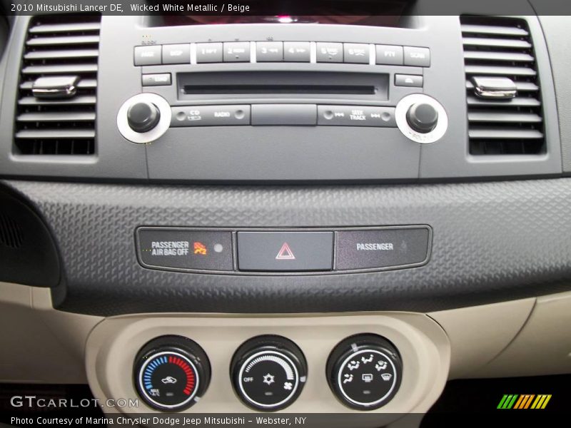 Wicked White Metallic / Beige 2010 Mitsubishi Lancer DE