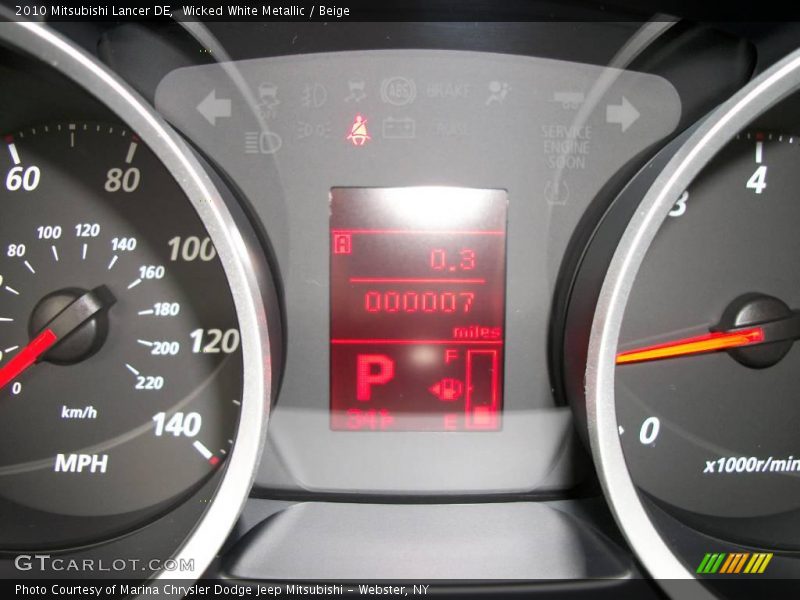 Wicked White Metallic / Beige 2010 Mitsubishi Lancer DE