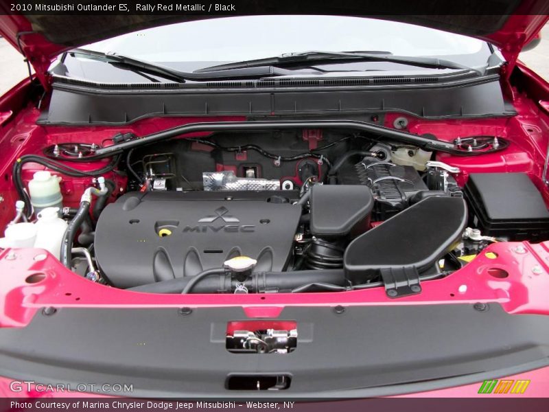 Rally Red Metallic / Black 2010 Mitsubishi Outlander ES