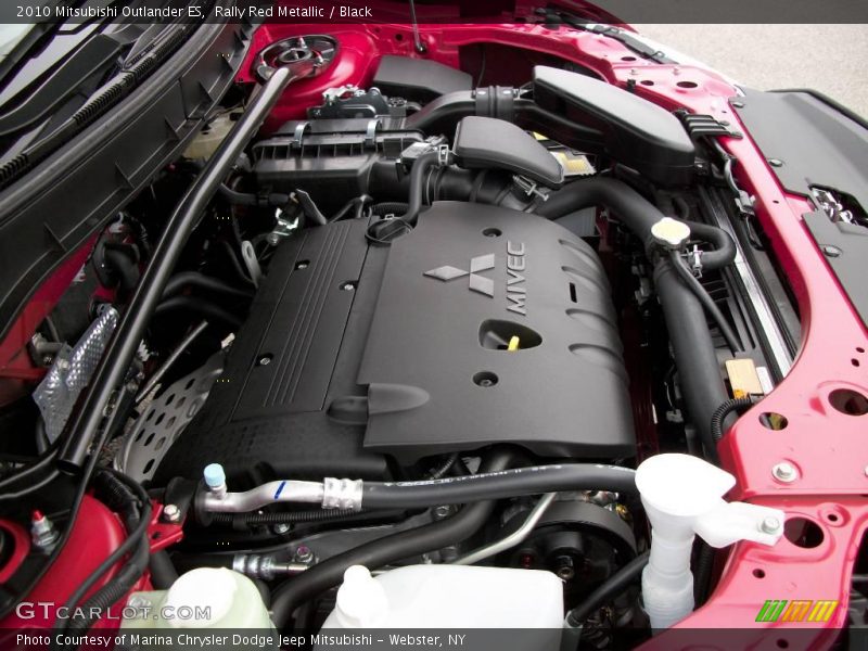 Rally Red Metallic / Black 2010 Mitsubishi Outlander ES