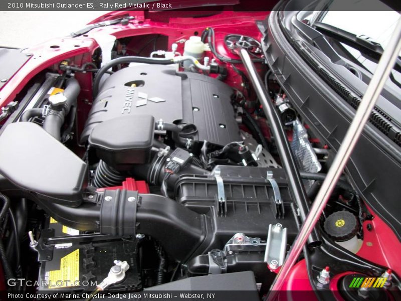 Rally Red Metallic / Black 2010 Mitsubishi Outlander ES