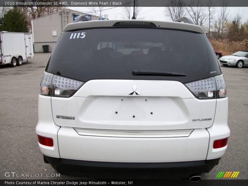 Diamond White Pearl / Black 2010 Mitsubishi Outlander SE 4WD