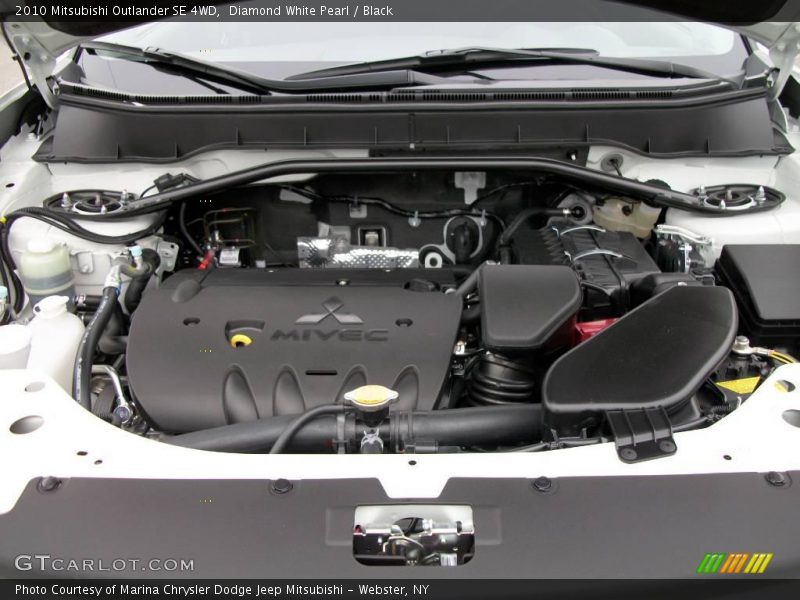 Diamond White Pearl / Black 2010 Mitsubishi Outlander SE 4WD