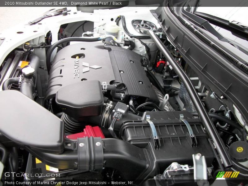 Diamond White Pearl / Black 2010 Mitsubishi Outlander SE 4WD