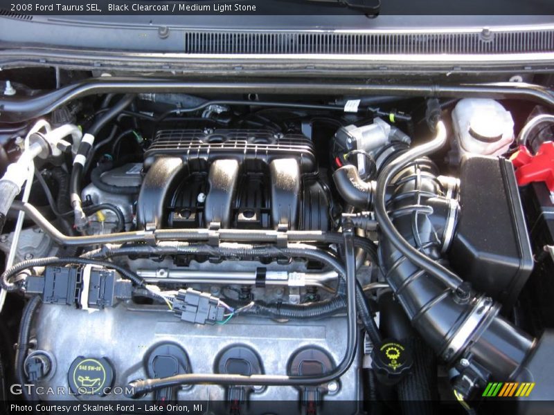 Black Clearcoat / Medium Light Stone 2008 Ford Taurus SEL