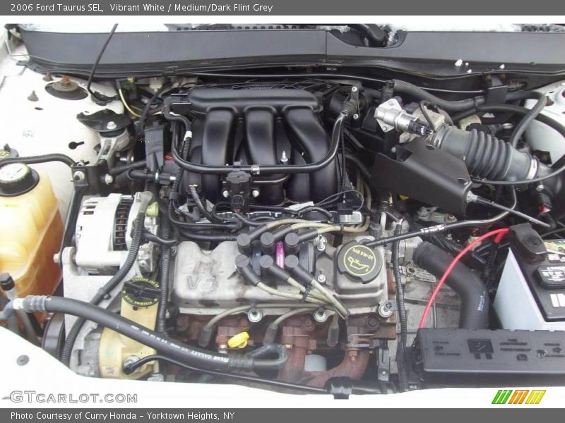 Vibrant White / Medium/Dark Flint Grey 2006 Ford Taurus SEL
