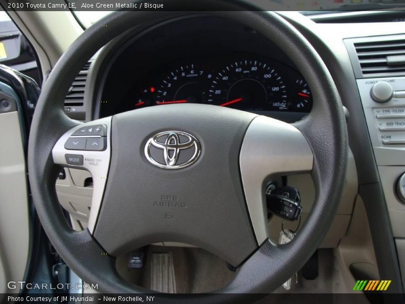 Aloe Green Metallic / Bisque 2010 Toyota Camry LE