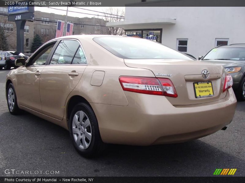 Sandy Beach Metallic / Bisque 2010 Toyota Camry LE