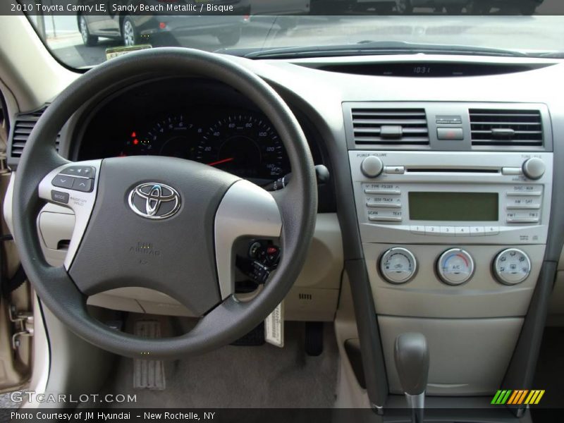 Sandy Beach Metallic / Bisque 2010 Toyota Camry LE