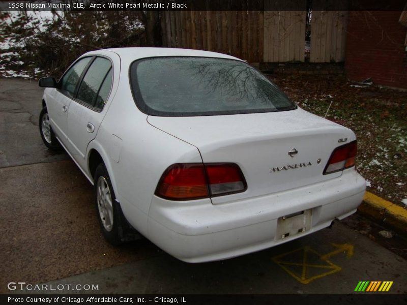 Arctic White Pearl Metallic / Black 1998 Nissan Maxima GLE