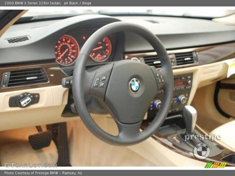 Jet Black / Beige 2009 BMW 3 Series 328xi Sedan