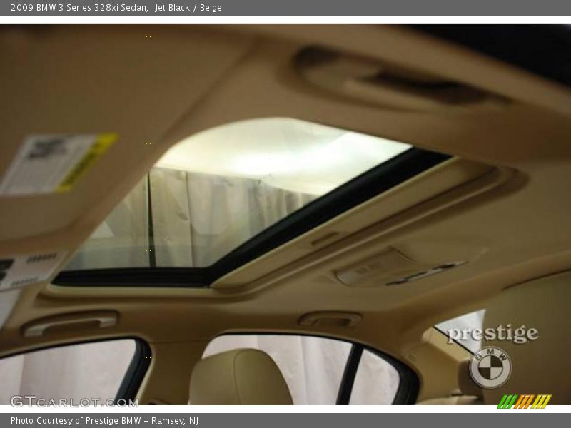 Jet Black / Beige 2009 BMW 3 Series 328xi Sedan