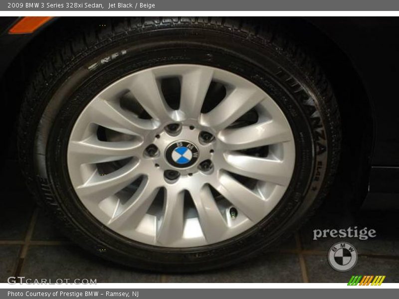 Jet Black / Beige 2009 BMW 3 Series 328xi Sedan