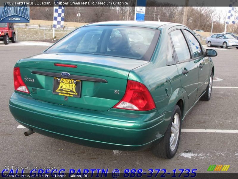 Grabber Green Metallic / Medium Graphite 2002 Ford Focus SE Sedan