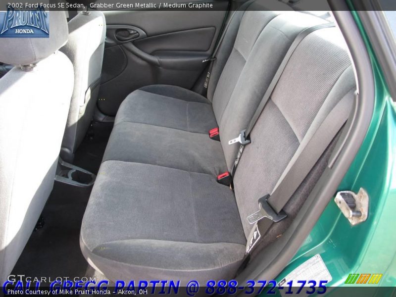 Grabber Green Metallic / Medium Graphite 2002 Ford Focus SE Sedan