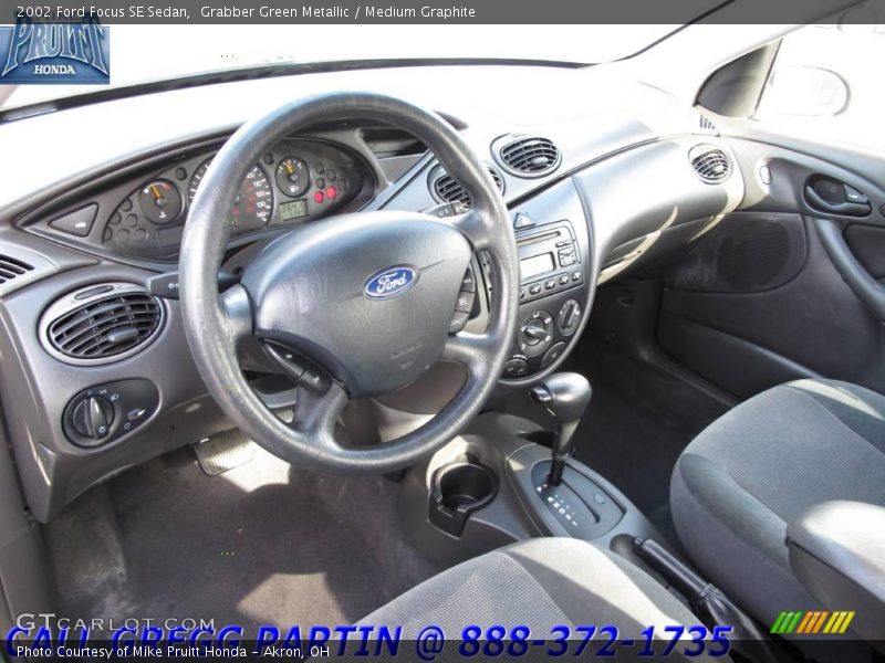 Grabber Green Metallic / Medium Graphite 2002 Ford Focus SE Sedan