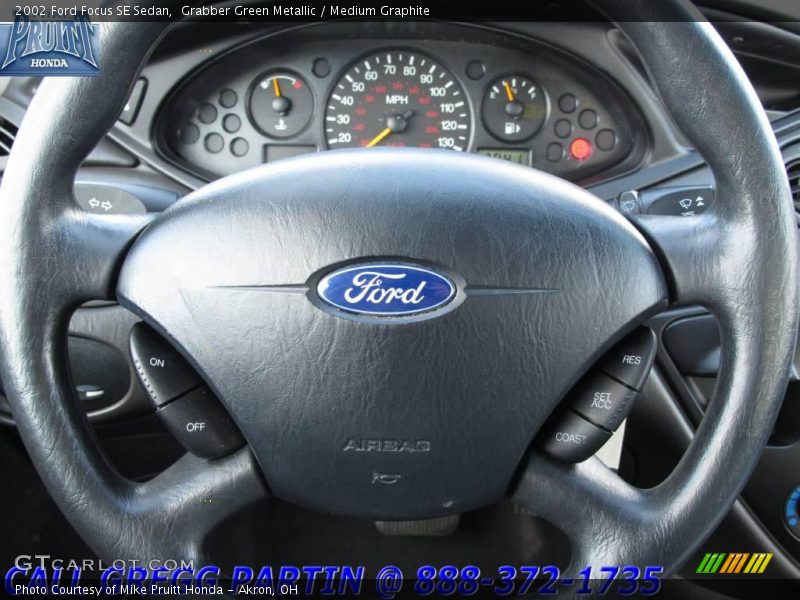Grabber Green Metallic / Medium Graphite 2002 Ford Focus SE Sedan