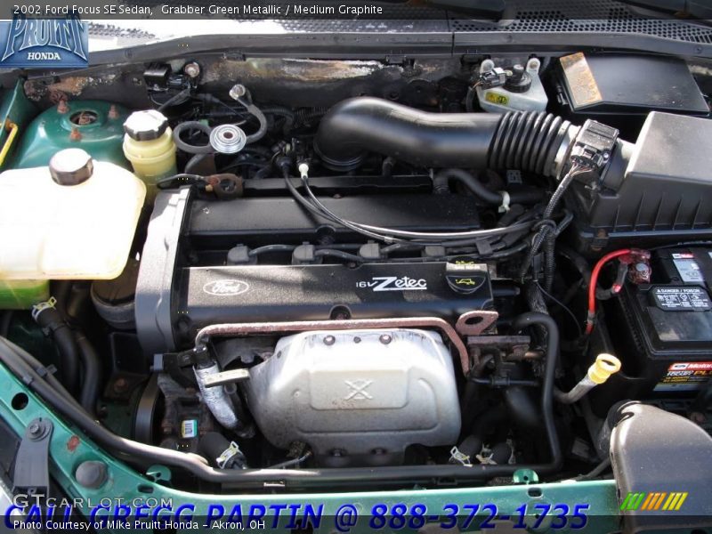 Grabber Green Metallic / Medium Graphite 2002 Ford Focus SE Sedan