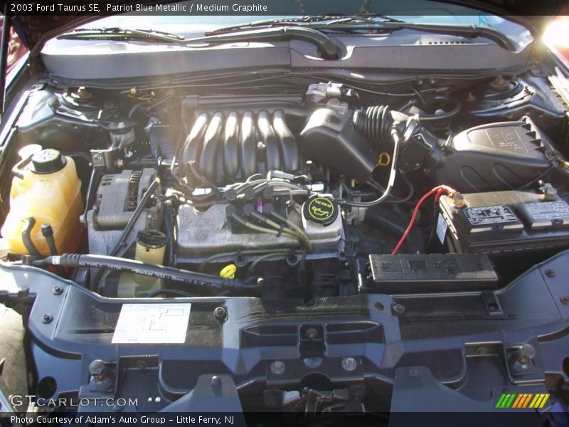 Patriot Blue Metallic / Medium Graphite 2003 Ford Taurus SE
