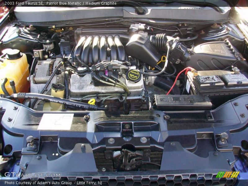 Patriot Blue Metallic / Medium Graphite 2003 Ford Taurus SE