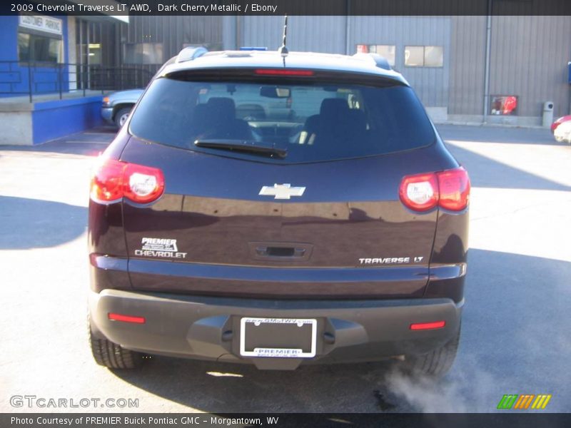 Dark Cherry Metallic / Ebony 2009 Chevrolet Traverse LT AWD