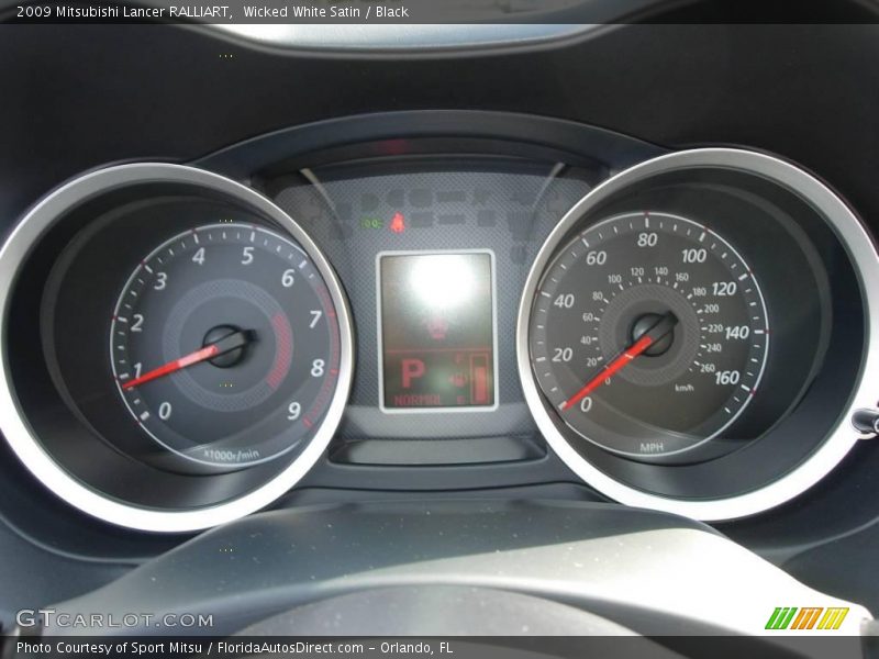 Wicked White Satin / Black 2009 Mitsubishi Lancer RALLIART