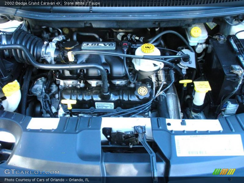 Stone White / Taupe 2002 Dodge Grand Caravan eX