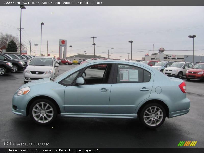 Vapor Blue Metallic / Black 2009 Suzuki SX4 Touring Sport Sedan