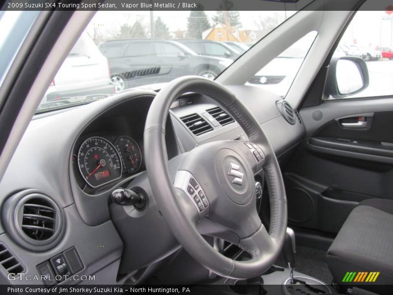 Vapor Blue Metallic / Black 2009 Suzuki SX4 Touring Sport Sedan