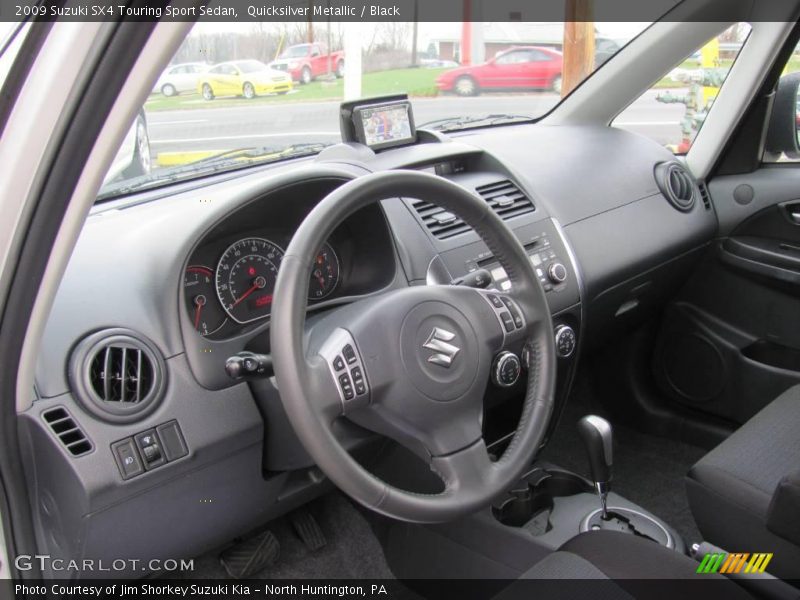 Quicksilver Metallic / Black 2009 Suzuki SX4 Touring Sport Sedan