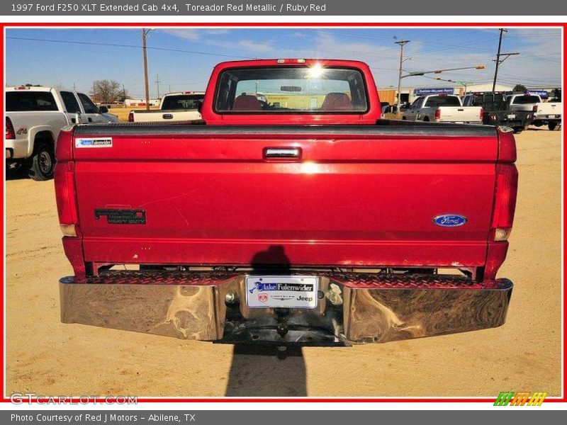 Toreador Red Metallic / Ruby Red 1997 Ford F250 XLT Extended Cab 4x4