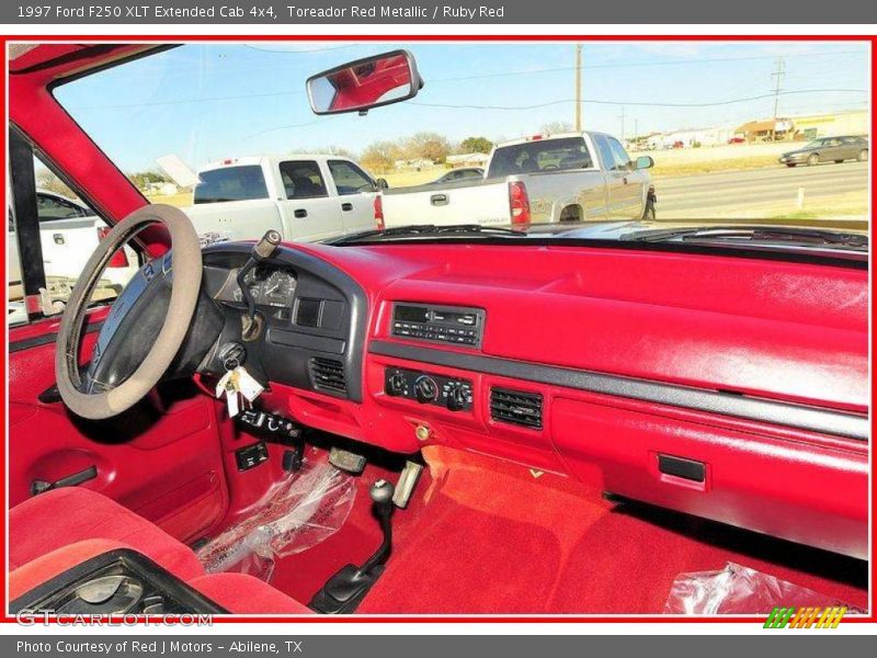 Toreador Red Metallic / Ruby Red 1997 Ford F250 XLT Extended Cab 4x4