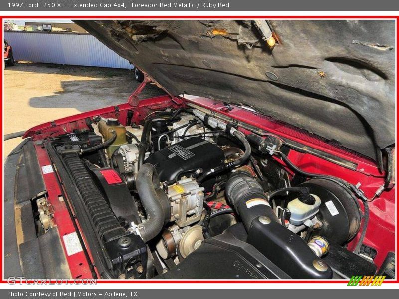 Toreador Red Metallic / Ruby Red 1997 Ford F250 XLT Extended Cab 4x4