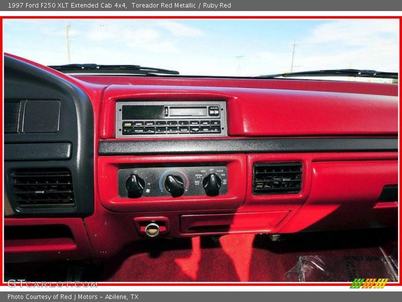 Toreador Red Metallic / Ruby Red 1997 Ford F250 XLT Extended Cab 4x4