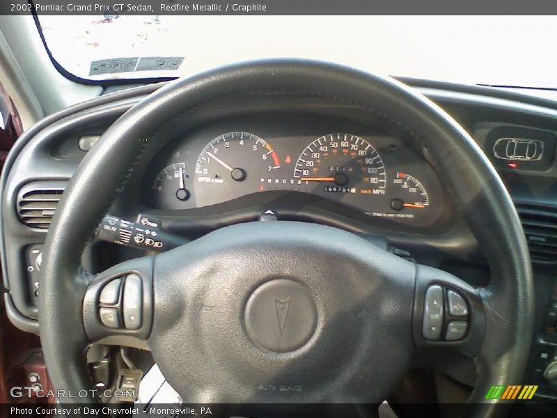 Redfire Metallic / Graphite 2002 Pontiac Grand Prix GT Sedan