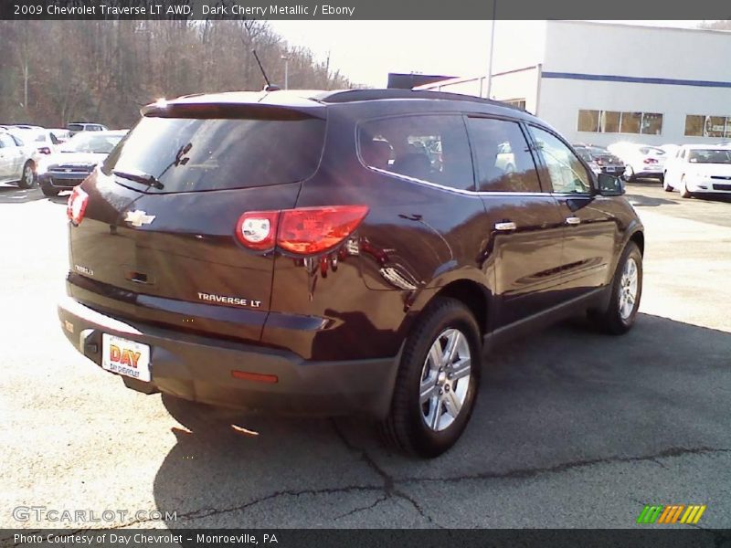 Dark Cherry Metallic / Ebony 2009 Chevrolet Traverse LT AWD