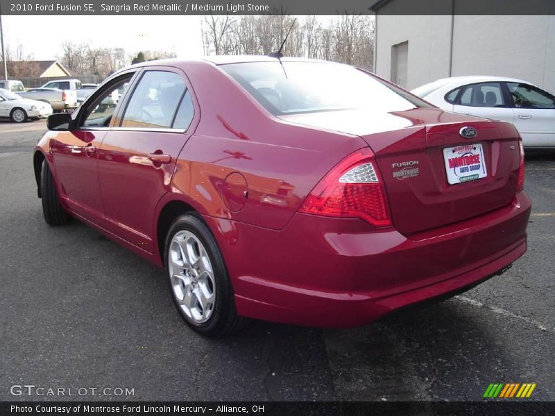 Sangria Red Metallic / Medium Light Stone 2010 Ford Fusion SE