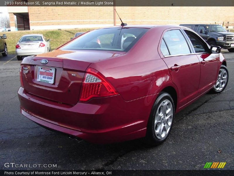 Sangria Red Metallic / Medium Light Stone 2010 Ford Fusion SE