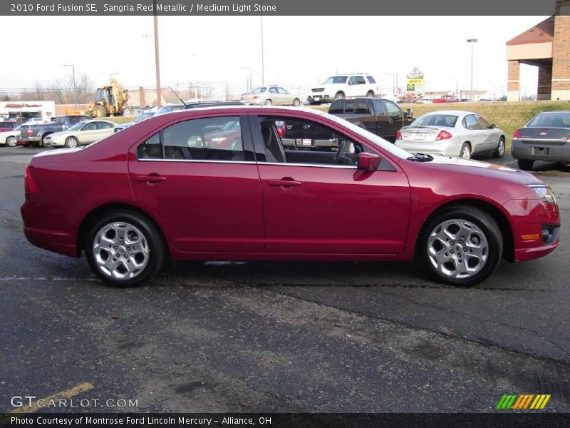 Sangria Red Metallic / Medium Light Stone 2010 Ford Fusion SE