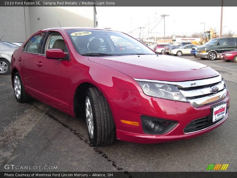Sangria Red Metallic / Medium Light Stone 2010 Ford Fusion SE