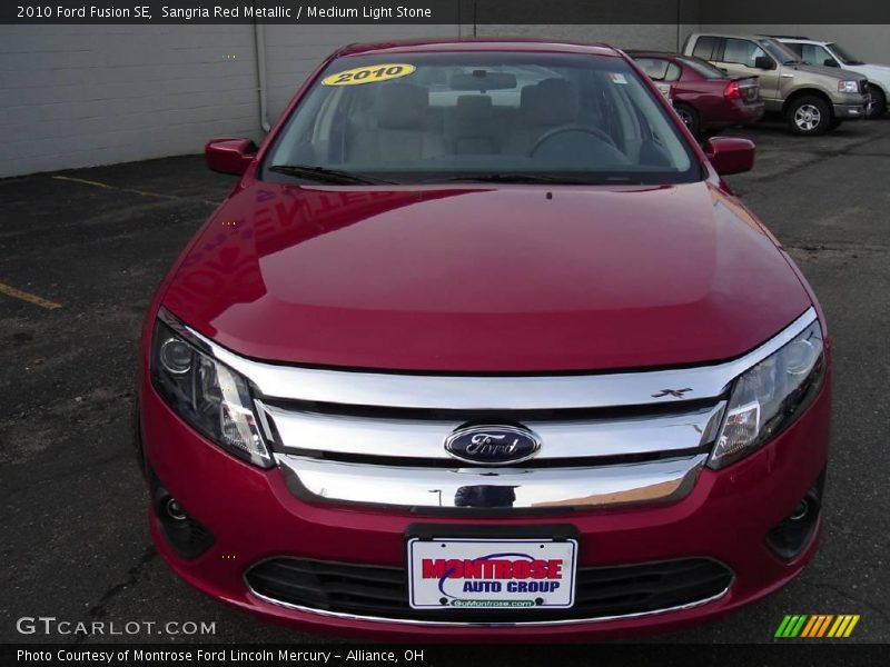 Sangria Red Metallic / Medium Light Stone 2010 Ford Fusion SE