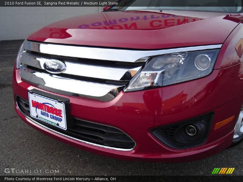 Sangria Red Metallic / Medium Light Stone 2010 Ford Fusion SE