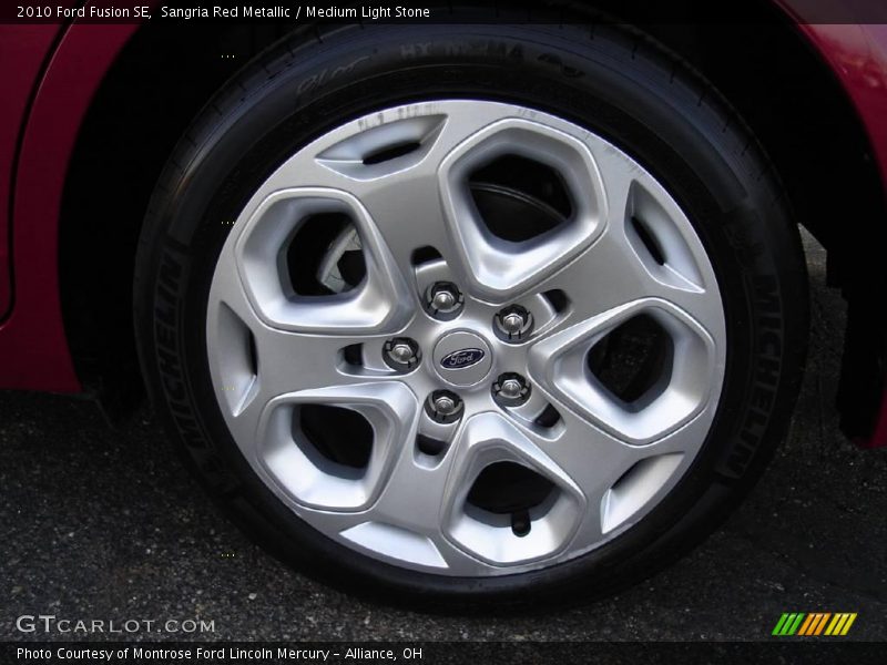 Sangria Red Metallic / Medium Light Stone 2010 Ford Fusion SE