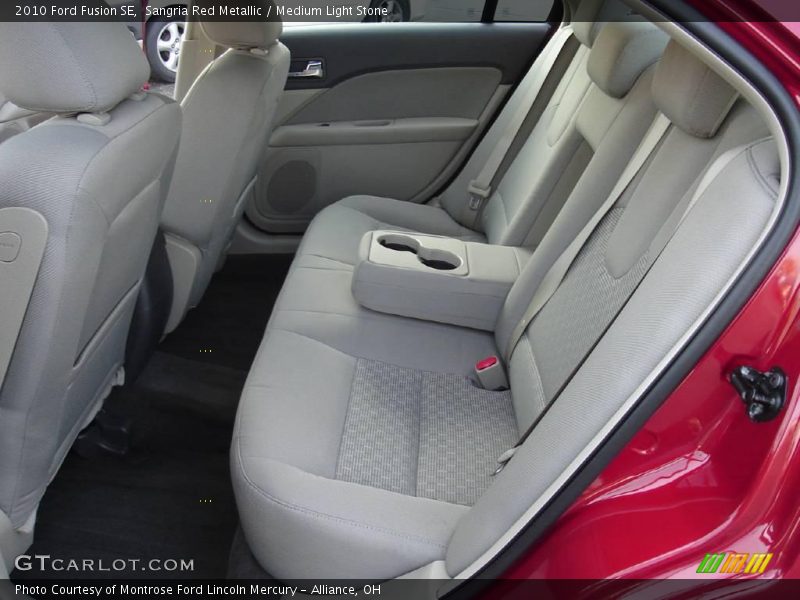 Sangria Red Metallic / Medium Light Stone 2010 Ford Fusion SE