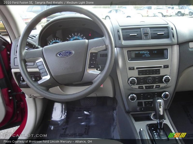Sangria Red Metallic / Medium Light Stone 2010 Ford Fusion SE