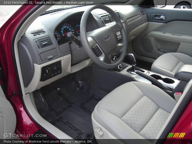 Sangria Red Metallic / Medium Light Stone 2010 Ford Fusion SE
