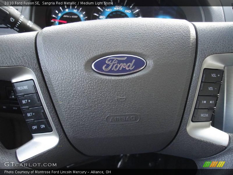 Sangria Red Metallic / Medium Light Stone 2010 Ford Fusion SE