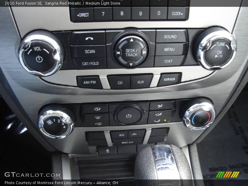 Sangria Red Metallic / Medium Light Stone 2010 Ford Fusion SE