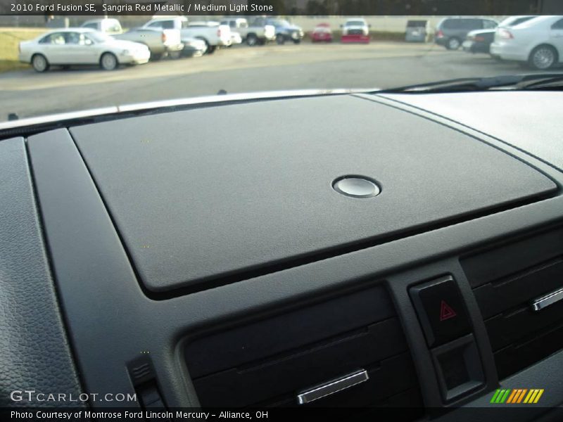 Sangria Red Metallic / Medium Light Stone 2010 Ford Fusion SE