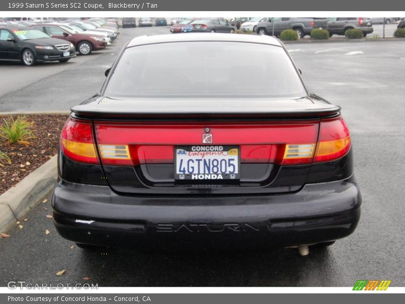 Blackberry / Tan 1999 Saturn S Series SC2 Coupe